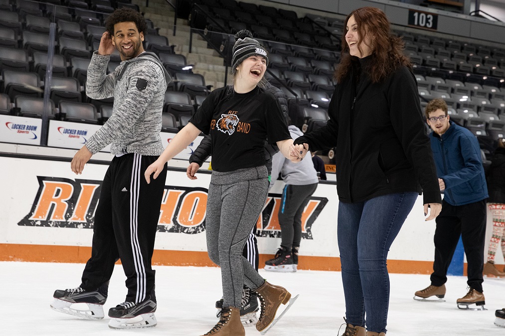Students skating on the RIT ice rink.