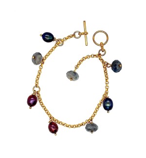 Bracelet made of a variety of glass, pearl, and labradorite beads dangling on a gold tone chain.