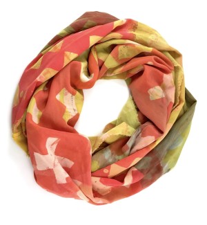 silk infinity scarf in orange and celery green with hand painted and printed 'X' pattern.