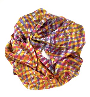 a silk scarf with a cross hatching of colors including purplr, gold, rose pink and white.
