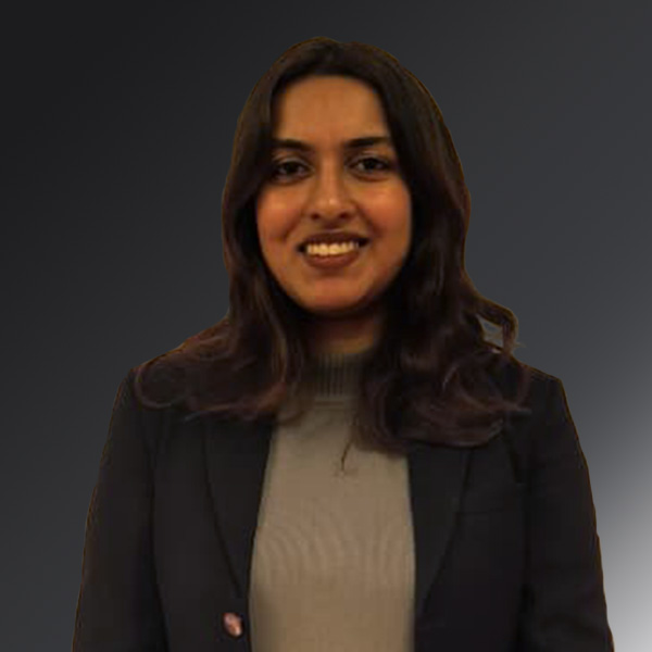 portrait of Oshin Joshi on a gray background