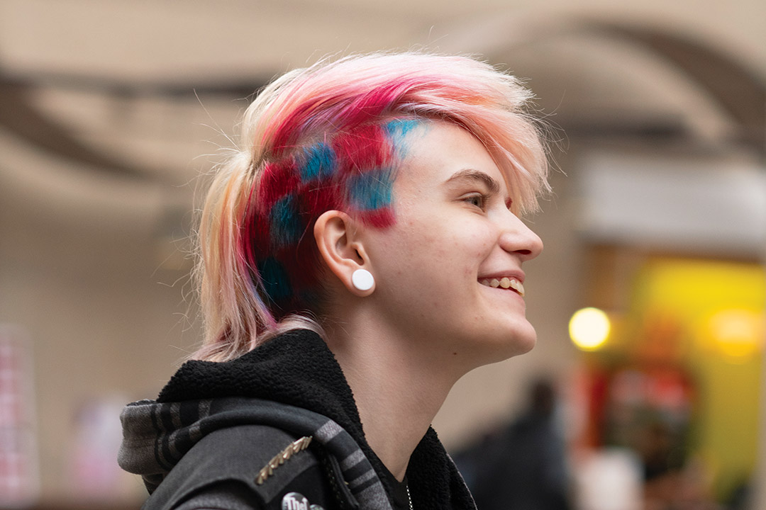 A student with colored hair