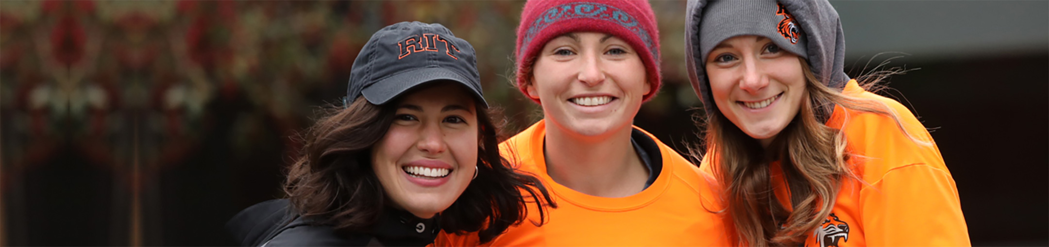 three female RIT students Smiling