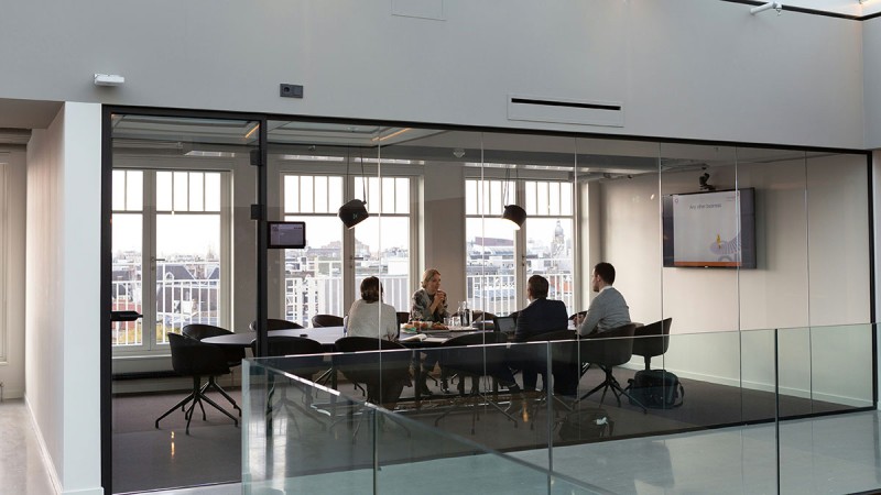 Third Person Point of View of Small Meeting in Office