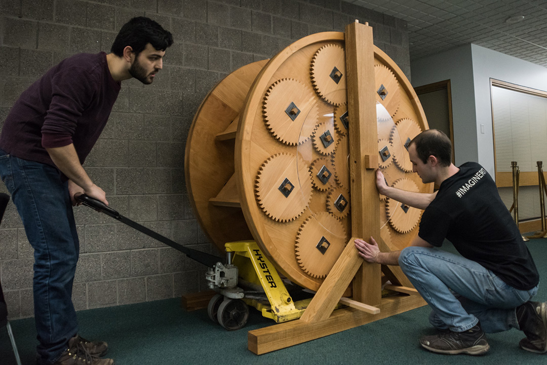 Students installing reading wheel, 2019.