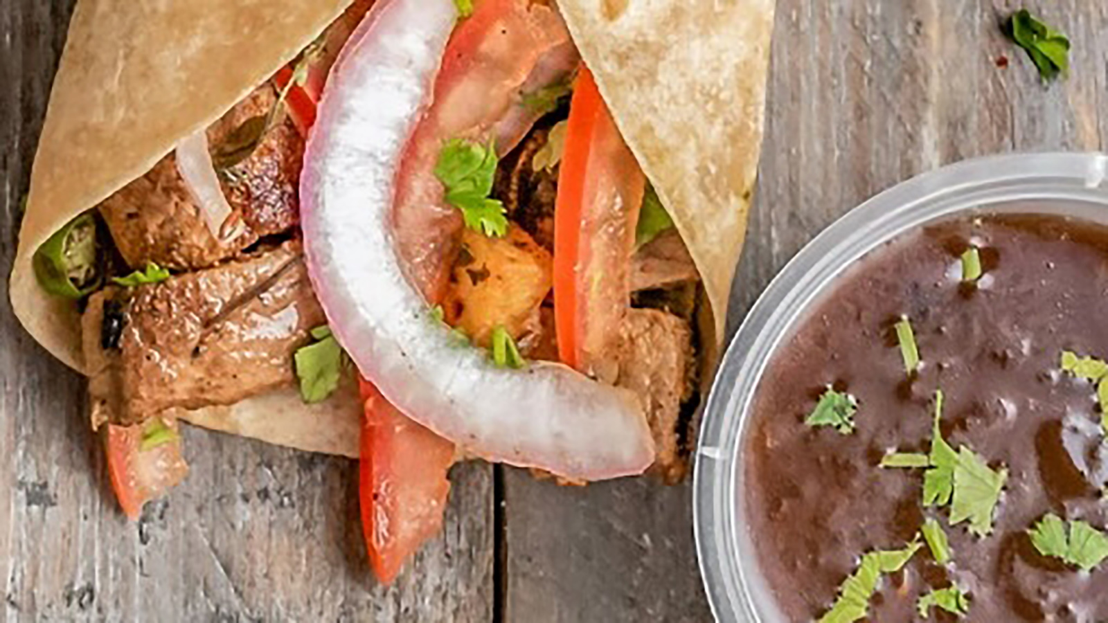 burritos on a wooden table