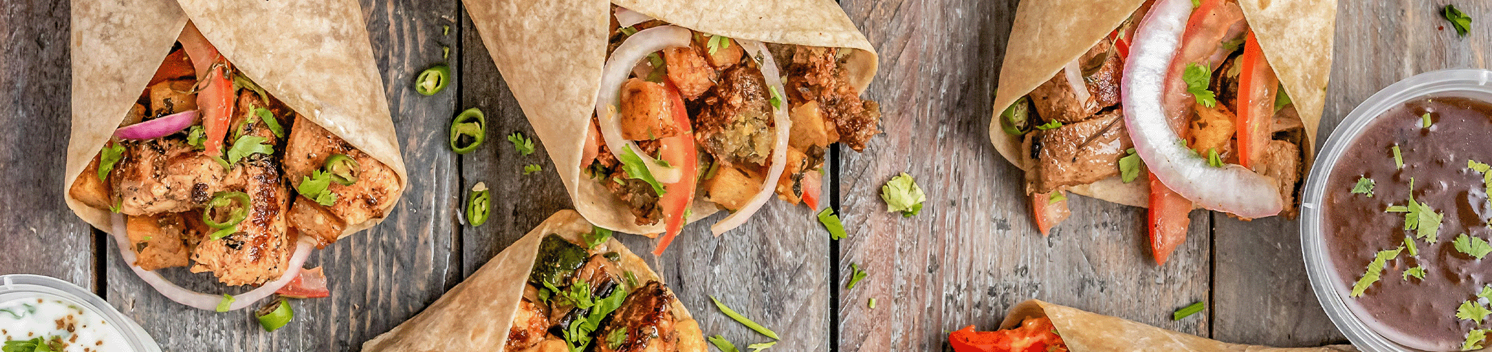 burritos on a wooden table