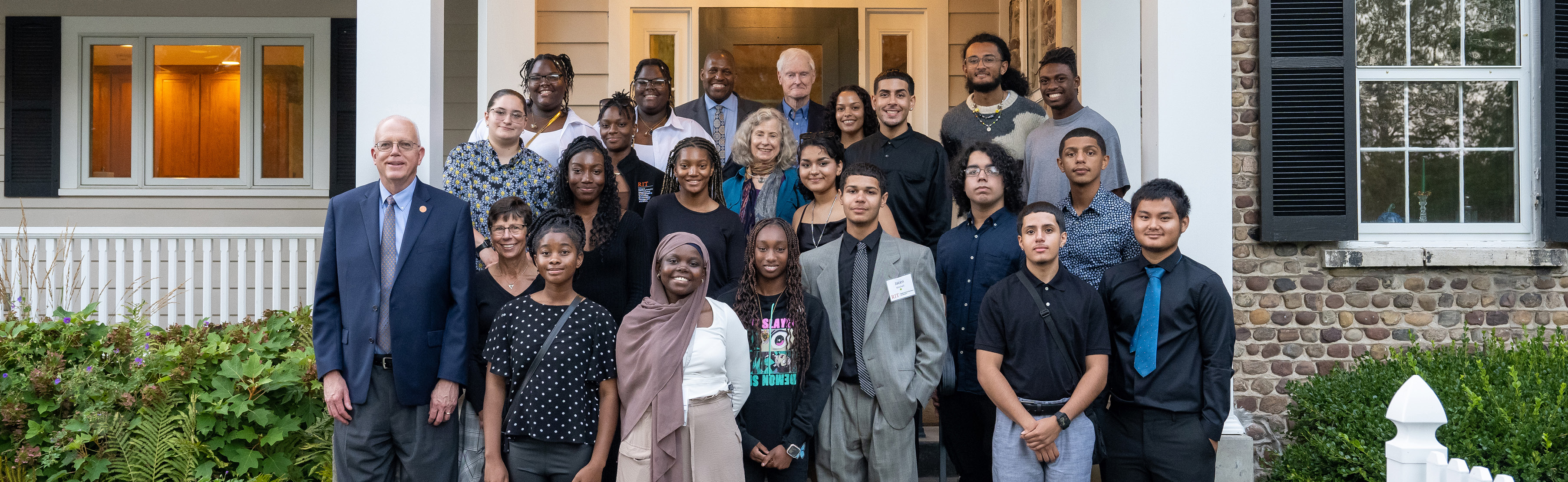 group photo of RCS students and RIT leadership