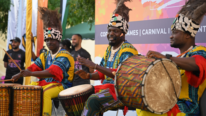 African group of performers beating the drums