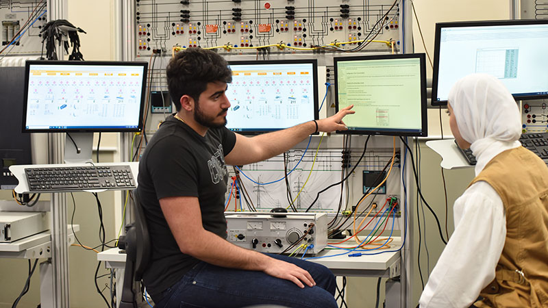 Students studying in a smart energy lab