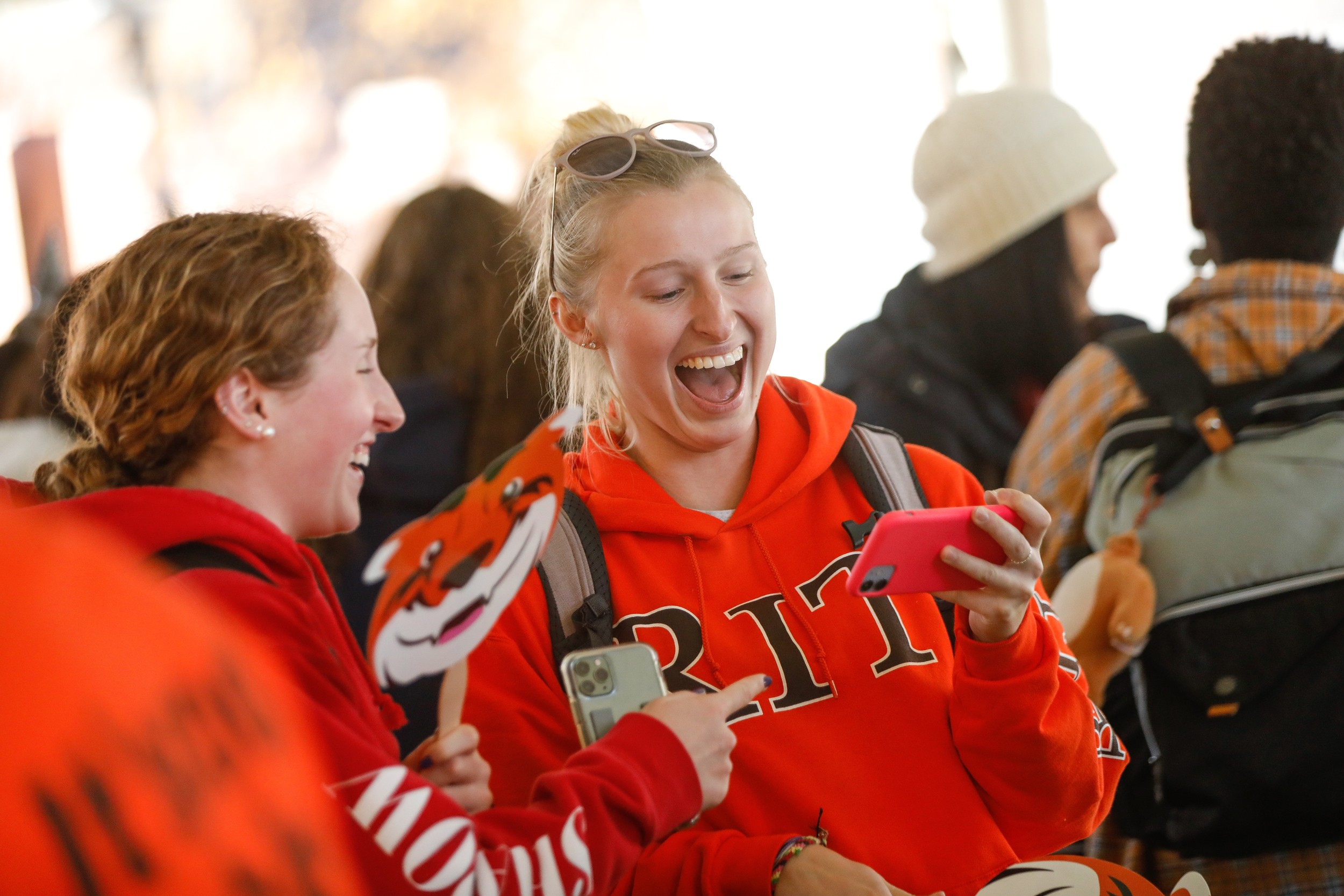 Students with RIT merchandize