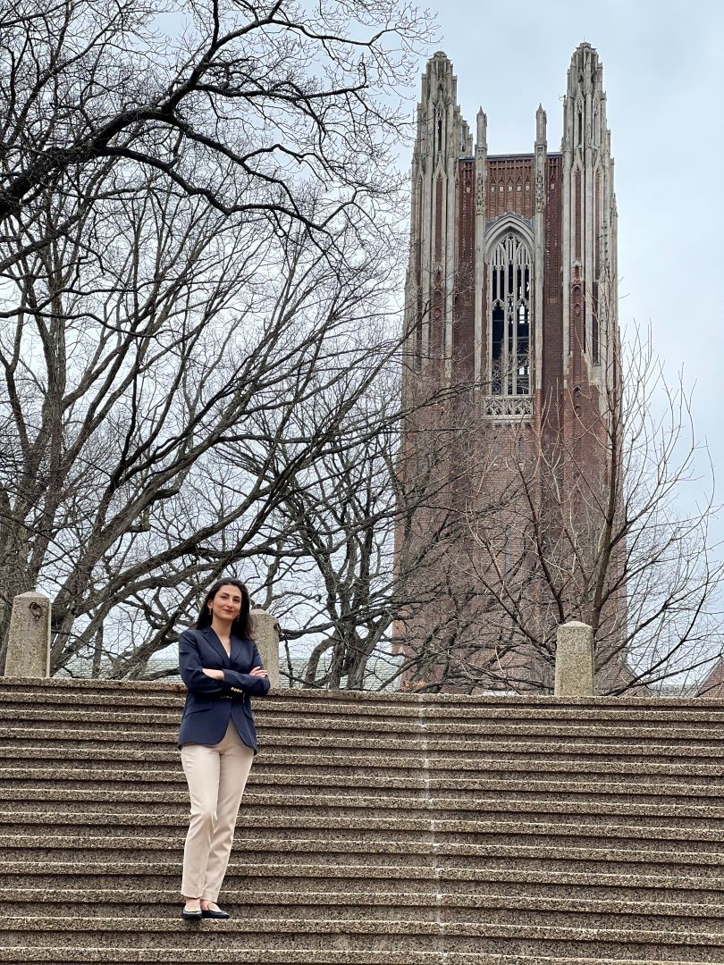 Mahsa Mozaffari posing on steps at Wellesley College