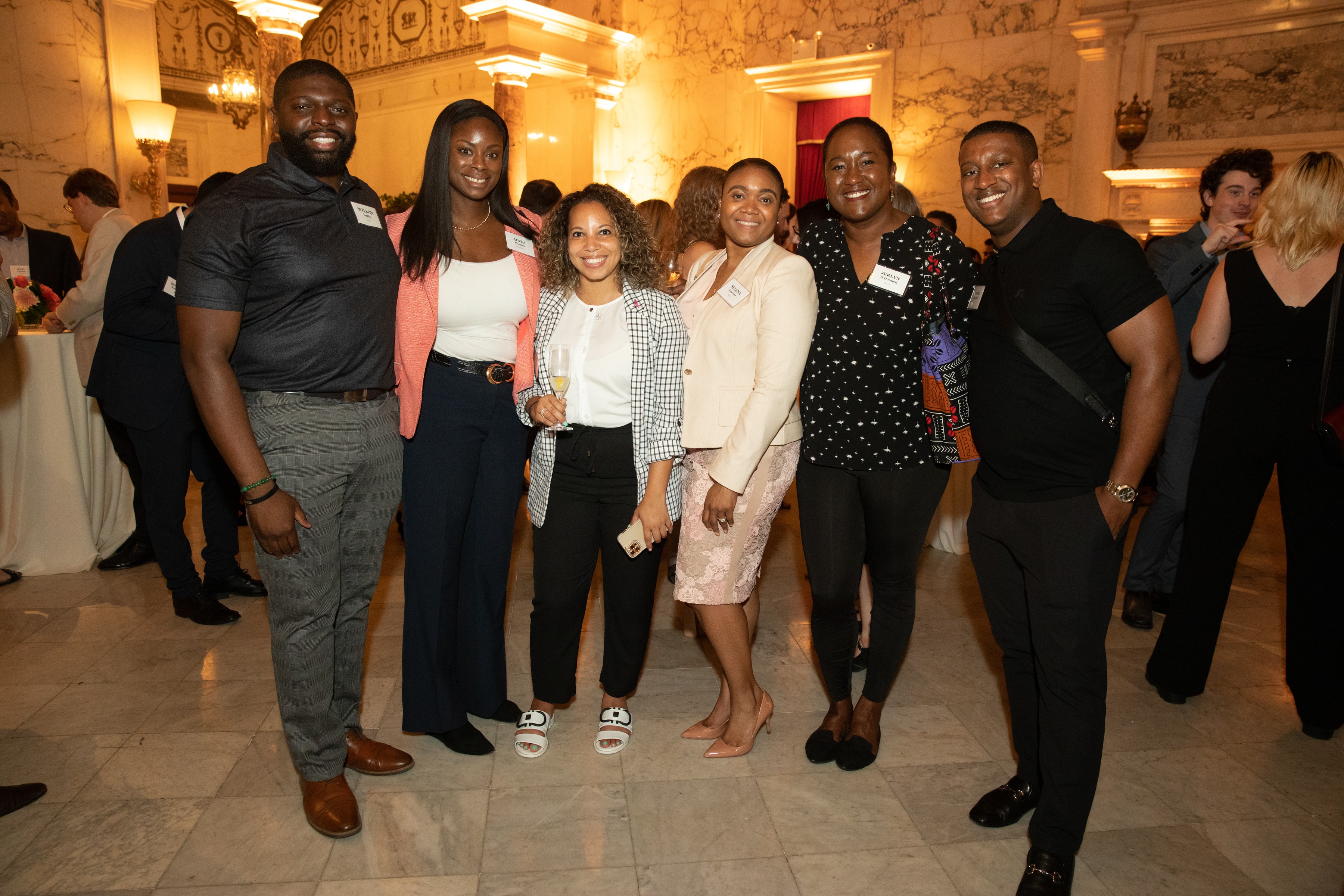 Photo of alumni networking at the NYC Visionaries event