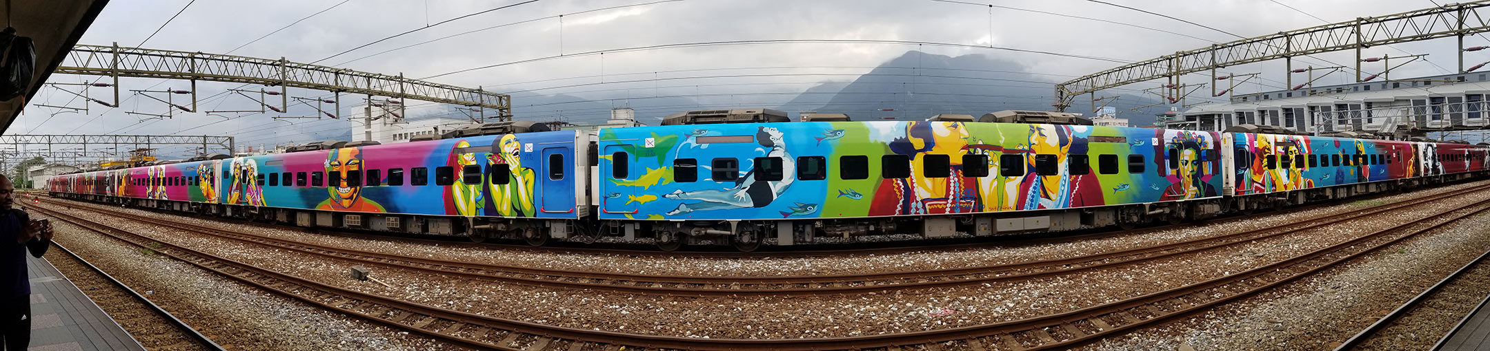 fisheye view of painted train cars
