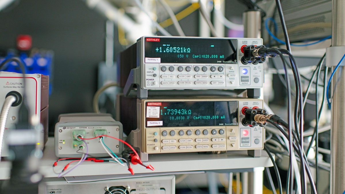 Close up of cords connected to a sourcemeter.