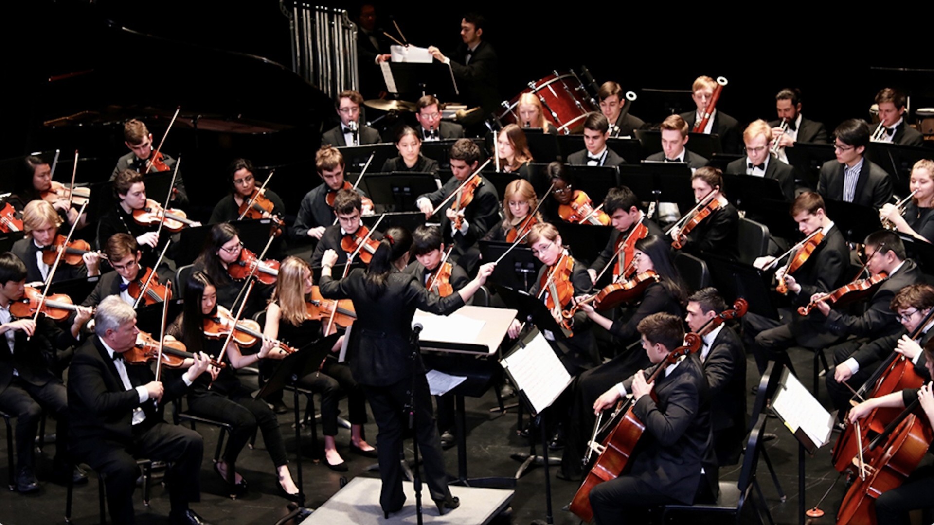 RIT Philharmonic Orchestra performing onstage in Ingle Auditorium