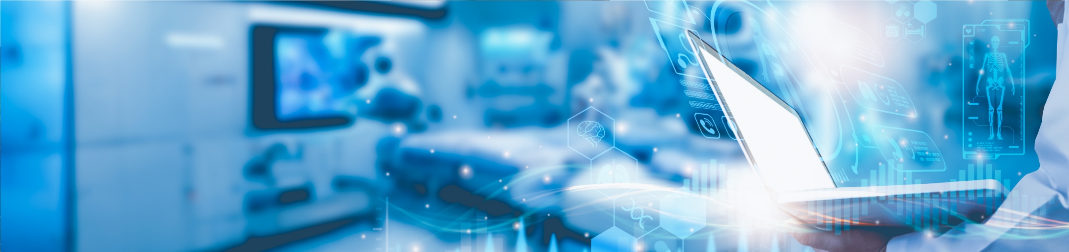 the background is an image of a medical lab tinted blue and blurred with graphics on top of the image are medical related icons coming out of a laptop being held by one arm in a white lab coat.