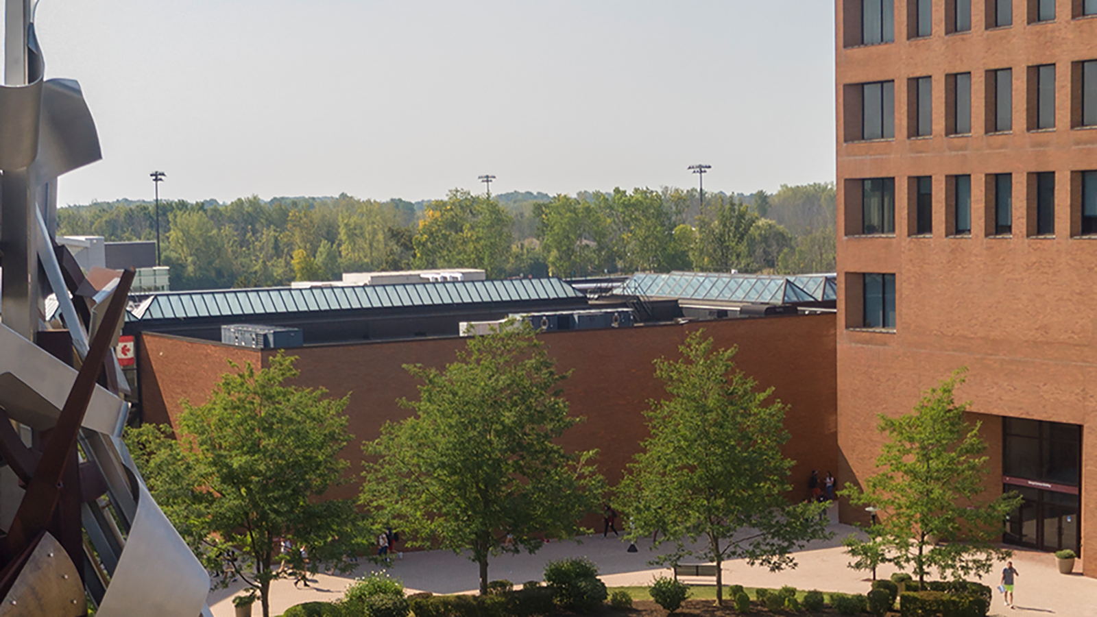 aerial image of the sentinel sculpture and Eastman Hall and SAU on RIT campus