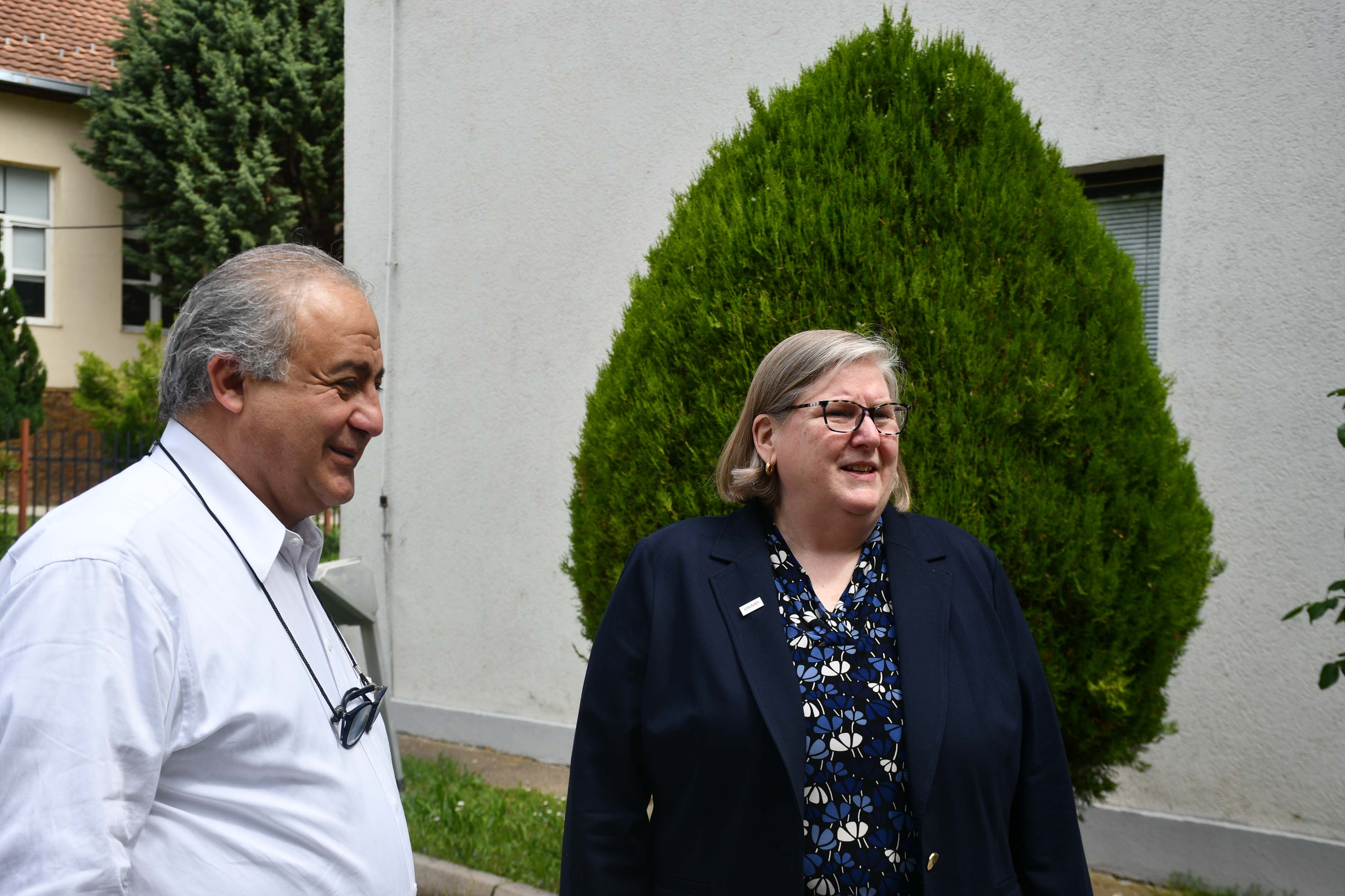 photo of Eileen Devitt with President Shahrabi at RIT Kosovo
