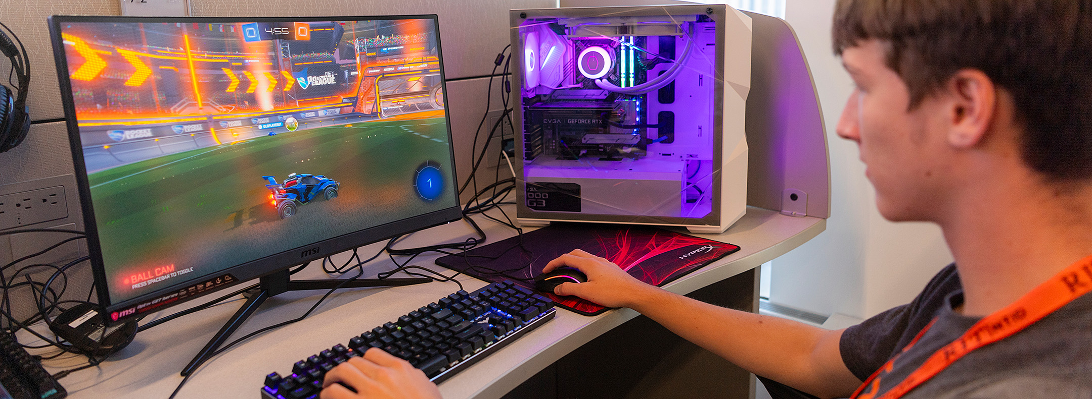 Student playing a video game on a computer