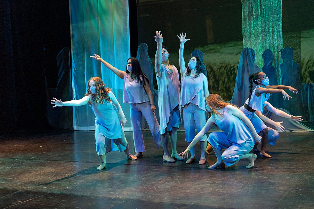 Dancers in blue costumes perform in a 2020 production of "Sppon River Anthologies, one of several offerings by RIT and NTID students.