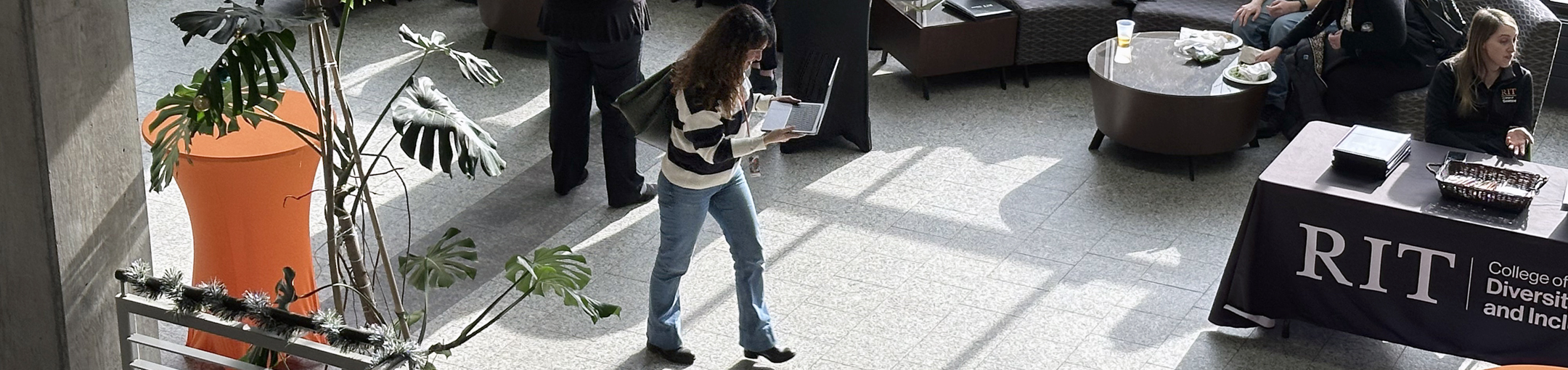 students walking around in the Gosnell atrium