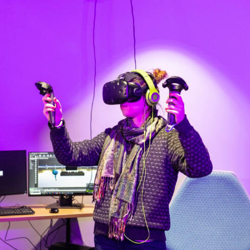 An RIT student using an HTC Vive virtual reality unit.