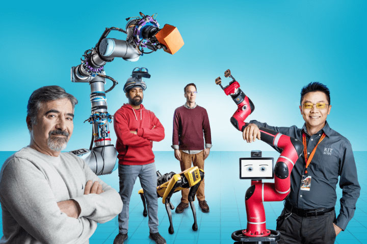 People posing next to various types of robotic arms and a robotic dog.