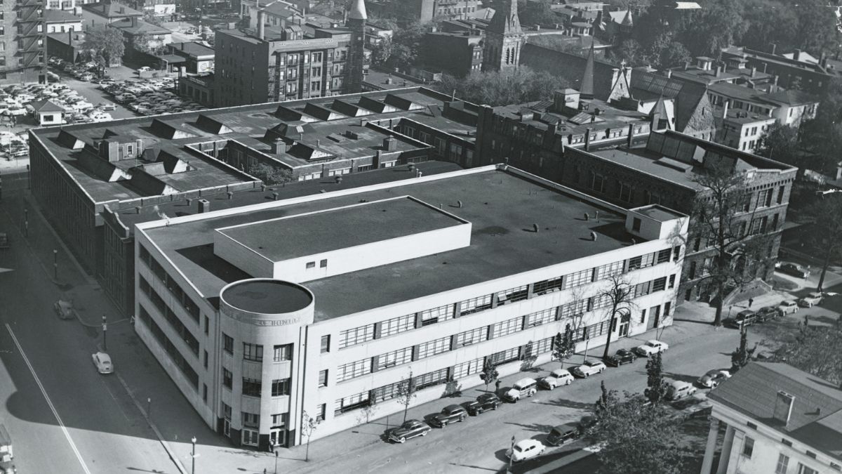 A historical black-and-white aerial view of R I T's old downtown Rochester campus.