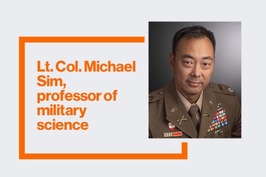 Lt. Col. Michael Sim is shown in a headshot with his name and title displayed to the left in orange.