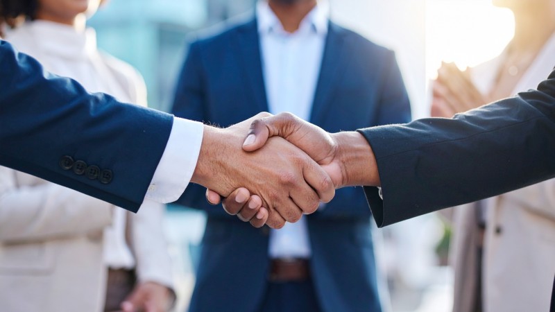 Two people shaking hands