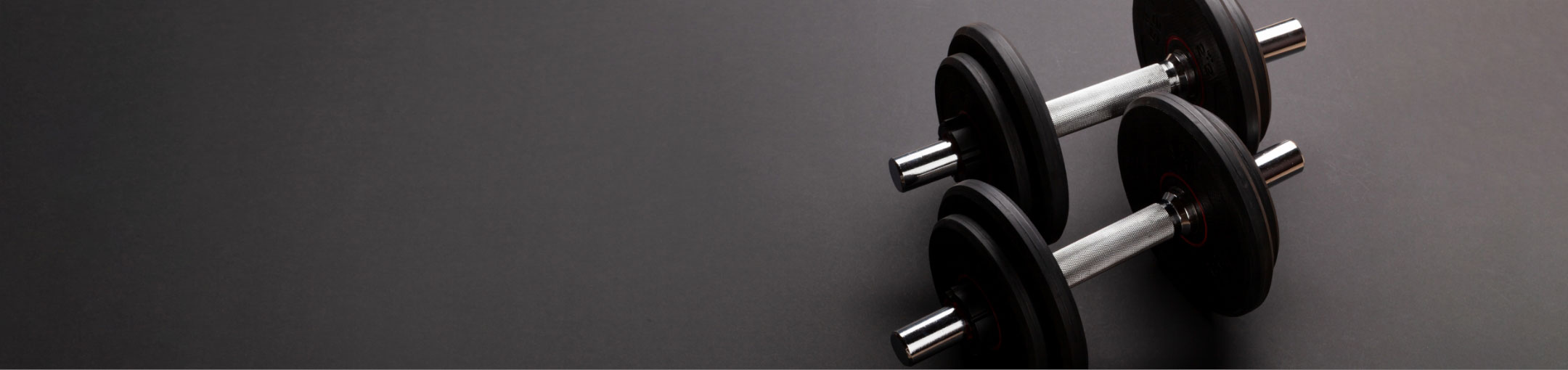 dumbbell weights on a mat