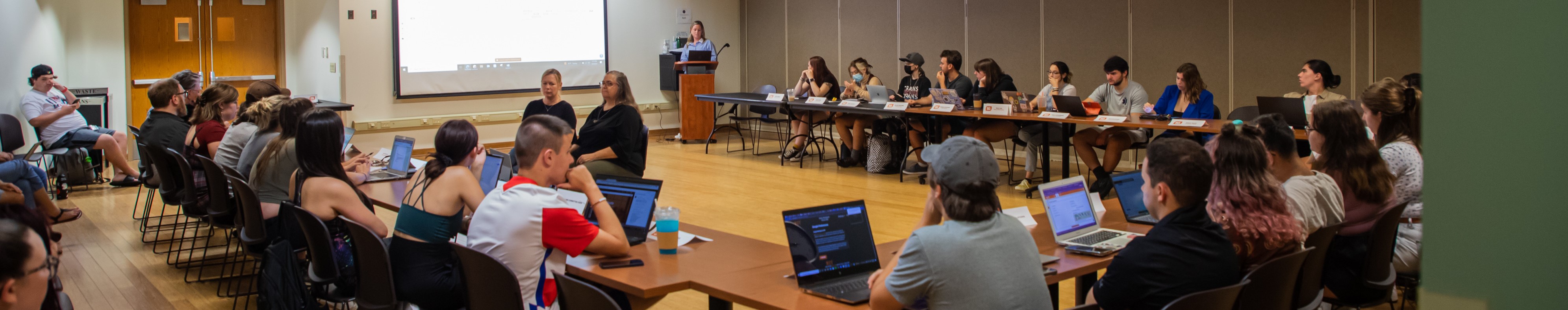 A group of students meeting for a Senate meeting.